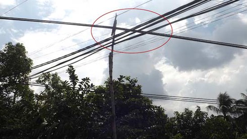 Dây điện cao thế sà sát nhà dân: Vẫn đủ tiêu chuẩn an toàn? - ảnh 3