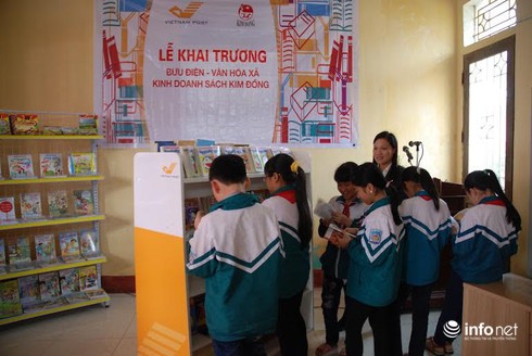 Đọc sách Kim Đồng tại điểm bưu điện văn hóa xã - ảnh 1