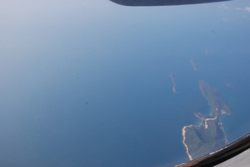 Máy bay MH370 mất tích: Hình ảnh tìm kiếm từ trên cao - ảnh 5