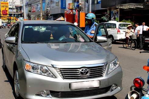 Uber, Grab bị xử phạt gần 300 triệu đồng trong tháng 10 tại TP.HCM - ảnh 1