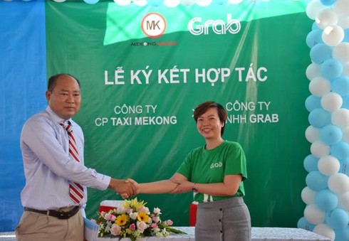 Grab vẫn bắt tay hãng taxi truyền thống, mở rộng trong tâm bão kiện cáo với Vinasun - ảnh 1