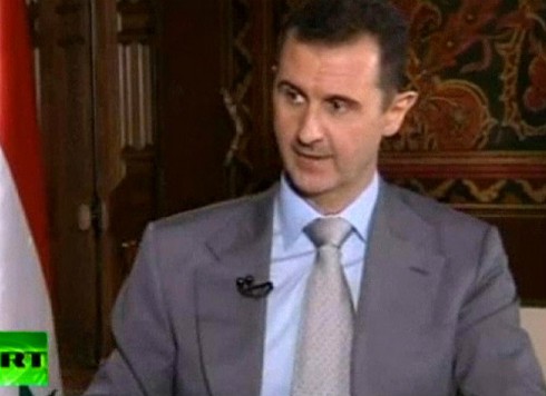 Tổng thống Assad: “Tôi sẽ sống và chết trên đất Syria” - ảnh 1