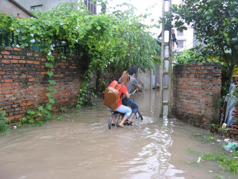 Hà Nội tái hiện trận lụt lịch sử năm 2008 - ảnh 16