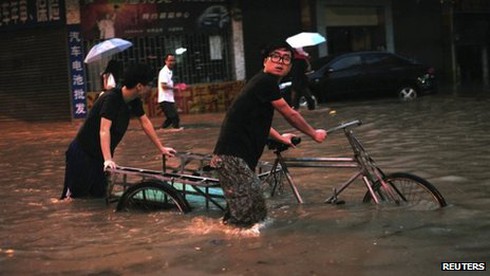 Trung Quốc: Ngập lụt nghiêm trọng, hơn 50 người chết - ảnh 1