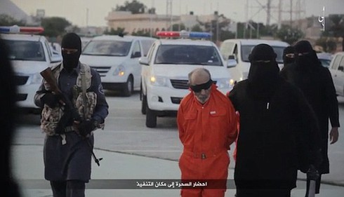IS lại tung video chặt đầu 2 người ở Libya - ảnh 3