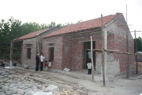 Khoảng 500.000 hộ nghèo được vay vốn làm nhà, lãi suất 3% - ảnh 1