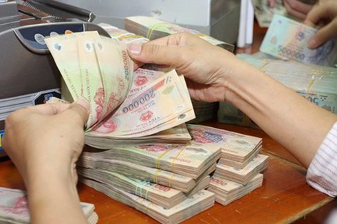Năm 2014: Cả nước tiết kiệm hơn 15.000 tỷ nhưng còn chi vượt dự toán - ảnh 1