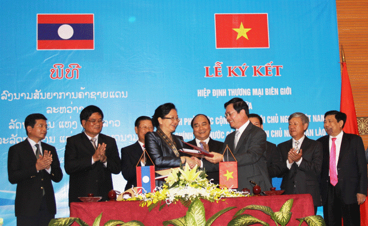 Phê duyệt Hiệp định thương mại biên giới Việt Nam-Lào - ảnh 1
