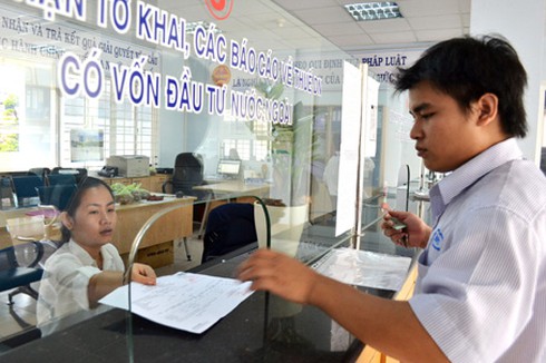 Chi phí cho thủ tục thuế tại Việt Nam gấp 7 lần Singapore - ảnh 1