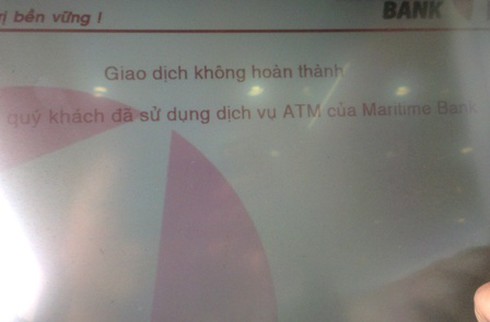 Nổi giận vì ATM không chịu nhả tiền ngày Tết - ảnh 1