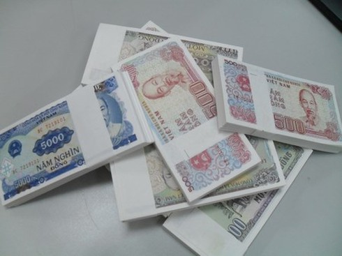 Phó Thống đốc: Cấm đưa tiền lẻ mới ra thị trường - ảnh 1