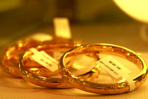 Giá vàng hôm nay 8/3 tăng gần 100.000 đồng/lượng, USD giảm rất nhẹ - ảnh 1