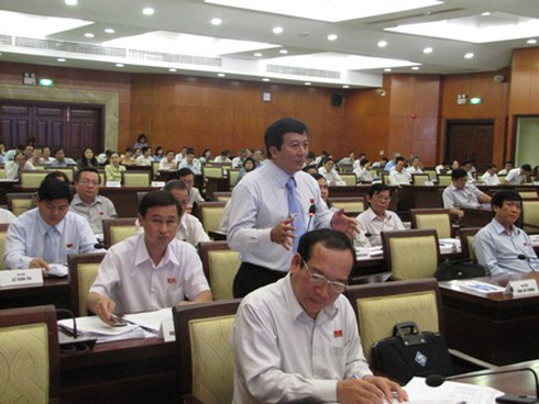 Sẽ thay HĐND quận, huyện bằng phòng dân quyền? - ảnh 1