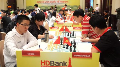 Giải cờ vua quốc tế HDBank: Quang Liêm trở lại tốp đầu - ảnh 1