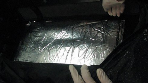 Ngụy trang 5kg cocain trị giá hơn 30 tỷ trong valy hai đáy - ảnh 1
