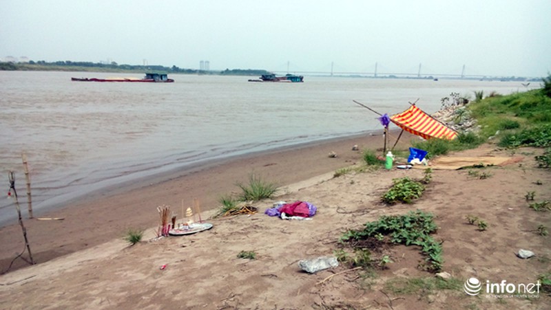 Nắng nóng, một phụ nữ xuống sông Hồng tắm giải nhiệt mất tích - ảnh 9