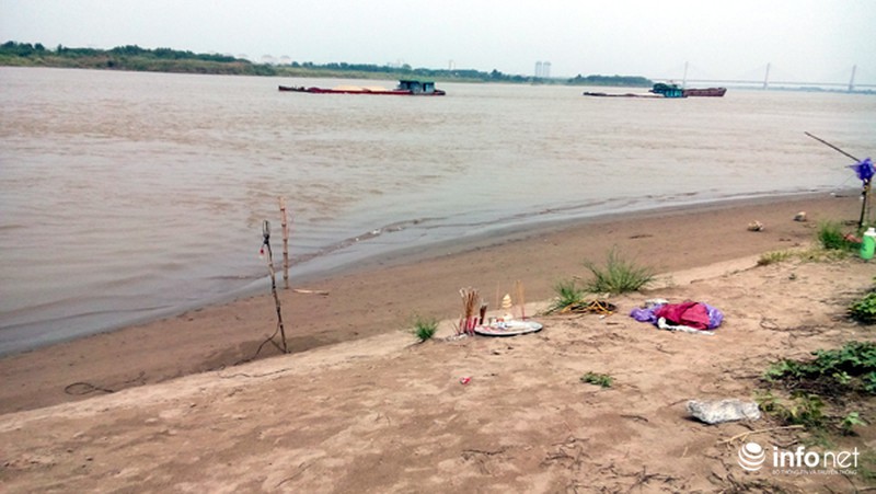 Nắng nóng, một phụ nữ xuống sông Hồng tắm giải nhiệt mất tích - ảnh 3