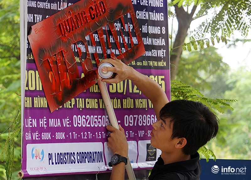 Phun sơn thông báo vi phạm lên panô quảng cáo khắp đường phố Hà Nội - ảnh 5