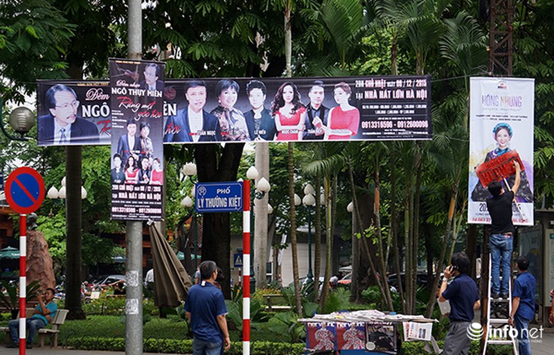 Phun sơn thông báo vi phạm lên panô quảng cáo khắp đường phố Hà Nội - ảnh 1
