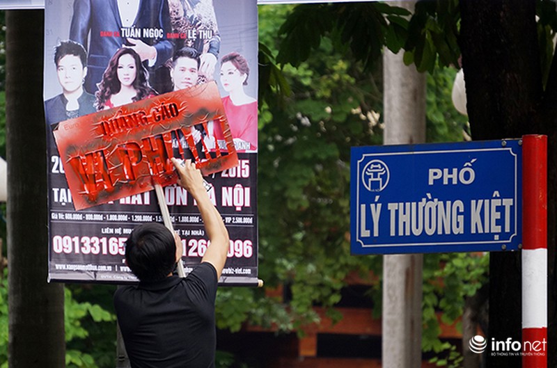 Phun sơn thông báo vi phạm lên panô quảng cáo khắp đường phố Hà Nội - ảnh 8
