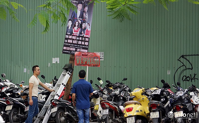 Phun sơn thông báo vi phạm lên panô quảng cáo khắp đường phố Hà Nội - ảnh 10