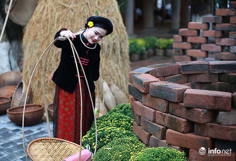 Thiếu nữ Hà Thành đẹp mê hồn trong trang phục truyền thống ngày Tết - ảnh 10