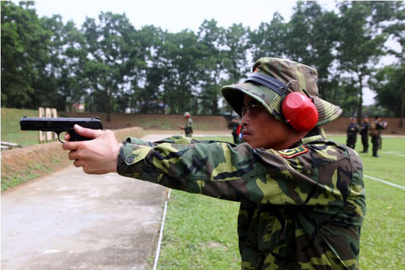 Xạ thủ quân đội VN trình diễn bài mẫu thi bắn súng quân dụng ASEAN - ảnh 5