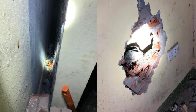 Bé trai vẫn còn dây rốn bị mẹ vứt vào khe tường - 1