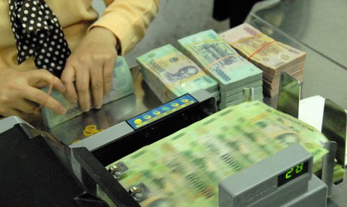 Lãi suất huy động tiếp tục giảm - ảnh 1