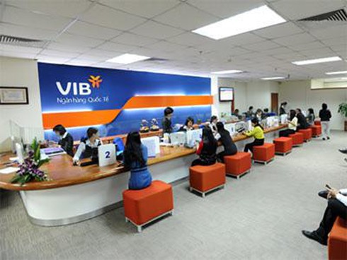 Nhà băng lại âm thầm huy động vượt trần - ảnh 1