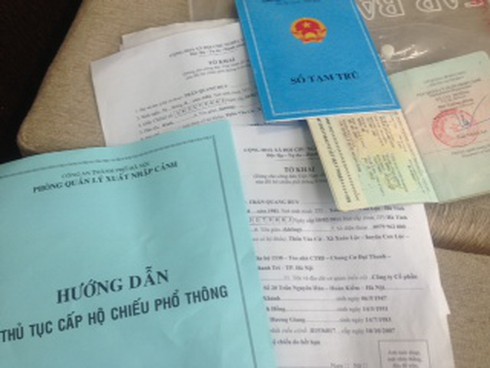 CA Hà Nội “vẽ” thêm thủ tục khi đổi hộ chiếu? - ảnh 1
