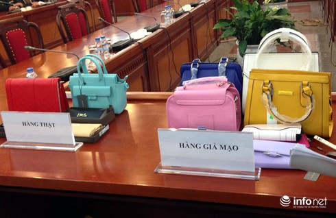 Tiêu hủy hơn 1.000 sản phẩm thời trang giả, phạt gần 2 tỷ đồng - ảnh 1