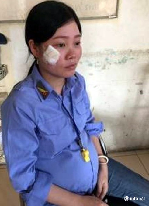 Nữ nhân viên gác tàu có bầu 6 tháng bị người đàn ông đi xe Innova đánh? - ảnh 1