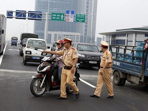 Hà Nội: Tổng xử phạt vi phạm giao thông 170 tỷ đồng năm 2014 - ảnh 1