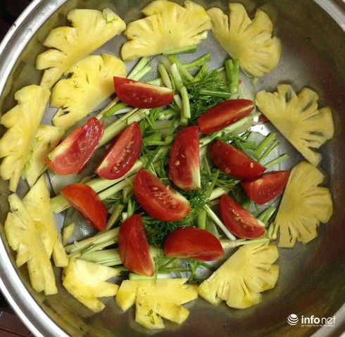 Cách làm món cá chép om dưa chua thanh, đậm vị, không béo ngấy - ảnh 2