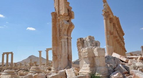 Man rợ mồ chôn tập thể tại thành phố cổ Palmyra, Syria - ảnh 1