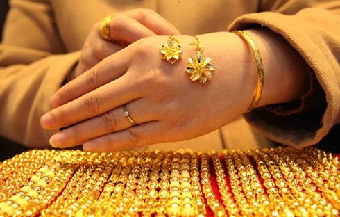 Giá vàng hôm nay 9/12 tăng nhẹ do đồng USD suy yếu - ảnh 1