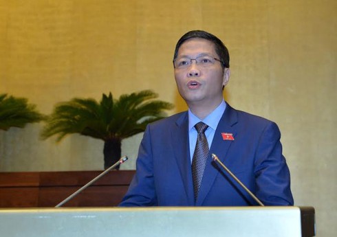 Quốc hội nghe Tờ trình và Báo cáo thẩm tra dự án Luật Quản lý ngoại thương - ảnh 1