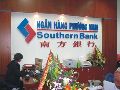 Sáp nhập ngân hàng ngày càng khốc liệt - ảnh 1