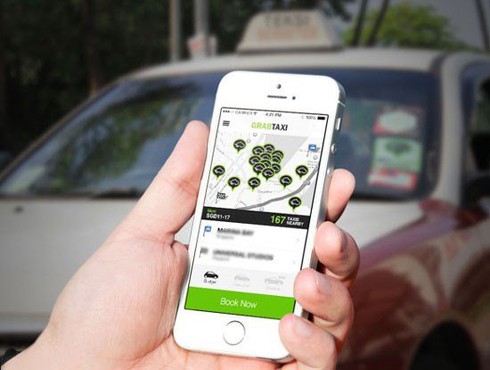 Hà Nội bắt đầu cấm xe Uber, Grab chạy trong giờ cao điểm ở 13 tuyến phố - ảnh 1