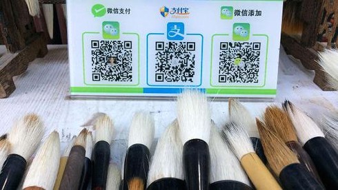 Ăn xin cũng dùng QR Code tại Trung Quốc, nhưng mọi thứ không phải màu hồng - ảnh 3