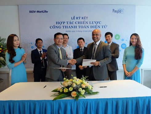 BIDV MetLife bắt tay Payoo, khách hàng thanh toán phí bảo hiểm cực tiện lợi - ảnh 1
