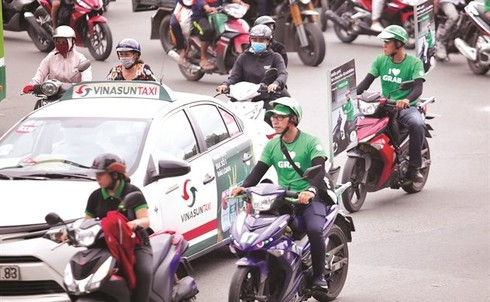 Nếu Vinasun thắng kiện, tất cả hãng taxi đổ xô kiện Grab thì sao? - ảnh 1