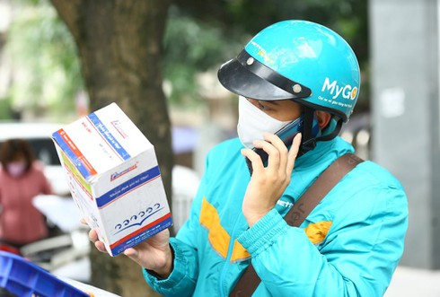 Cách chống dịch của các công ty giao hàng thời dịch bệnh - ảnh 1