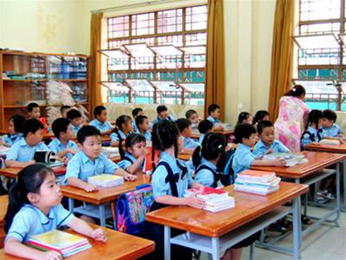 Trả học sinh sớm để thu thêm tiền trông trả muộn - ảnh 1