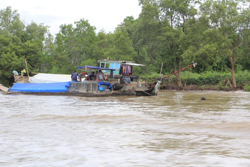 Ngắm cuộc sống sông nước của người dân Cà Mau - ảnh 15