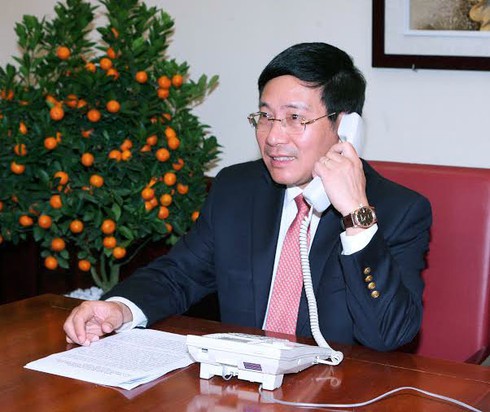 PTT Phạm Bình Minh điện đàm với Ngoại trưởng Mỹ, Trung Quốc - ảnh 1