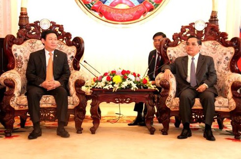 Ông Vương Đình Huệ hội kiến Thủ tướng Lào - ảnh 1