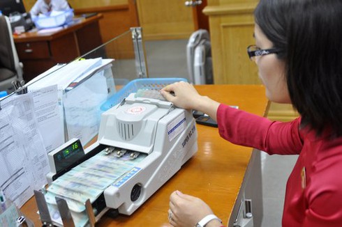 “Ông lớn” ngân hàng ép lãi suất xuống thấp kỷ lục - ảnh 1