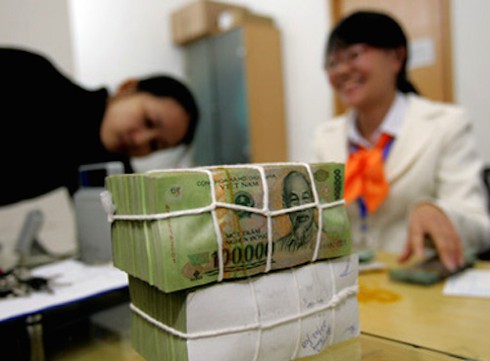 Năm 2015, chưa thể tăng lương vì còn phải... trả nợ - ảnh 1